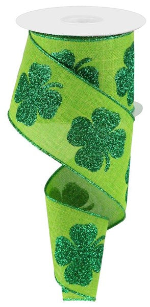 a green ribbon with shamrocks on it