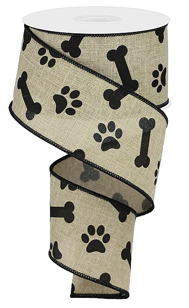 A beige ribbon with black paw prints printed on it.