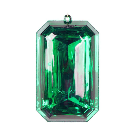 a green tourmaline is shown on a white background