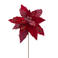 a red flower on a stick with a white background