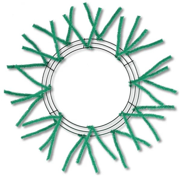 A circular wreath made of green pipe cleaners arranged in a radial pattern.