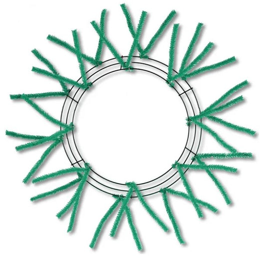 A circular wreath made of green pipe cleaners arranged in a radial pattern.