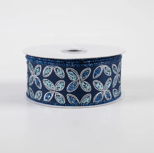 A roll of blue and white floral patterned ribbon.