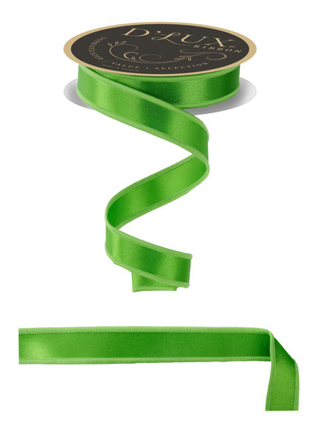 a green ribbon with a black label, and there is a long green ribbon below it.