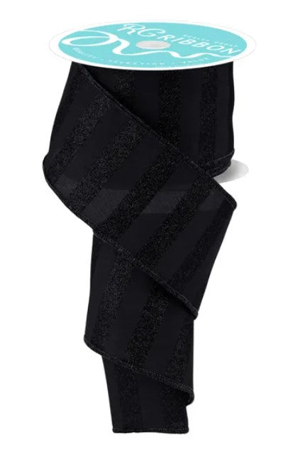 a black ribbon with a teal-colored label on top of it.