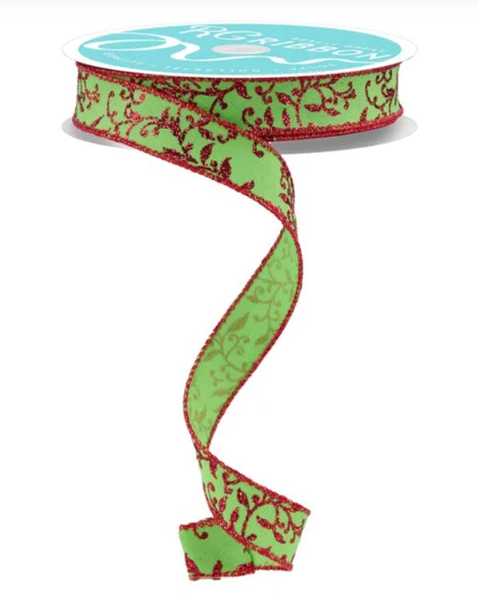 A green and red floral patterned ribbon is shown, with the ribbon winding around a spool of the same ribbon.