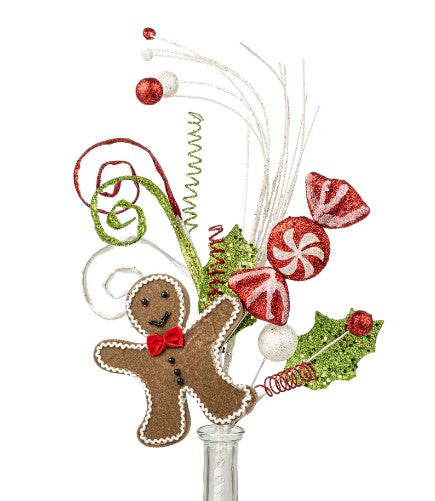 a glass vase filled with a christmas decoration