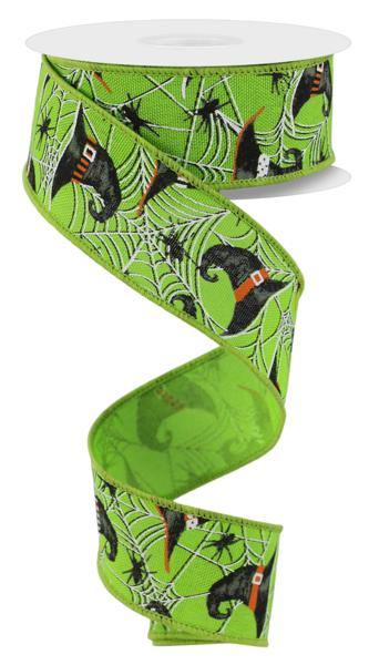 A green and black spider web ribbon with a witch hat pattern.