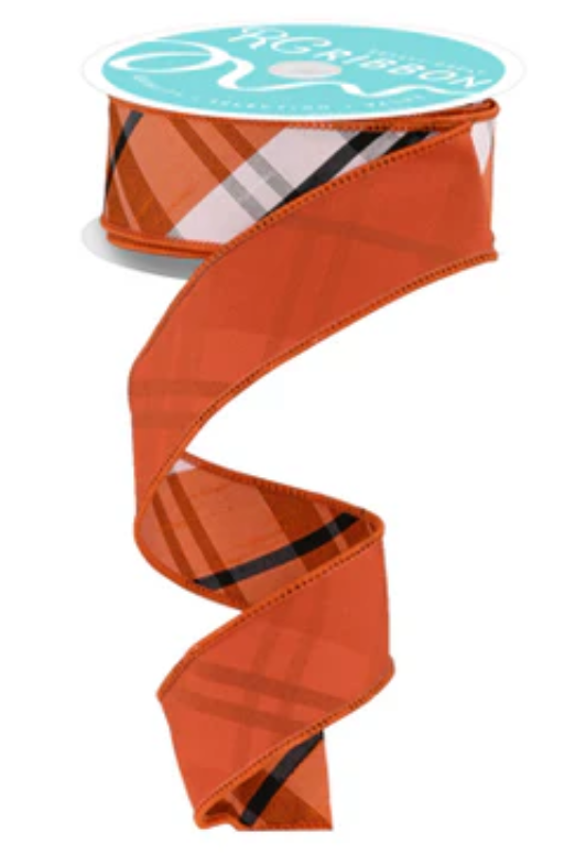 a roll of orange ribbon with a blue top