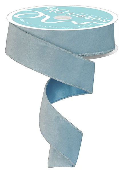 A roll of light blue satin ribbon with a white label.