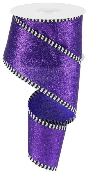 a roll of purple glitter ribbon on a white background