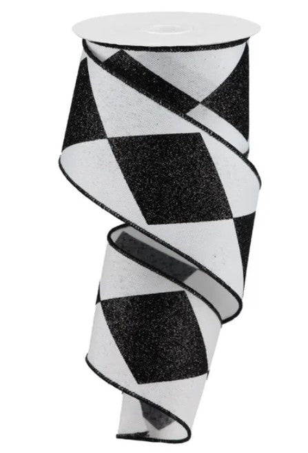 A black and white checkered pattern ribbon is shown, with a white base and a black and white checkered pattern.