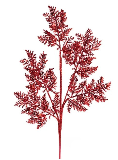 a red, glittery tree branch with multiple branches and leaves.
