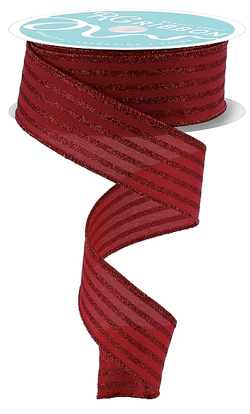 a red ribbon with a metallic sheen, coiled and twisted in a spiral pattern.