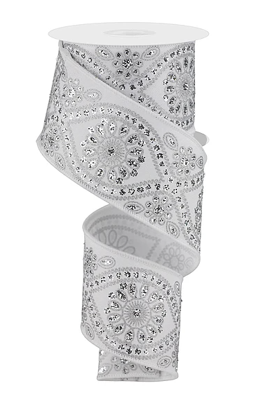 A decorative silver and white ribbon with a floral pattern.