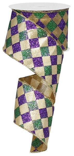 a roll of purple and green glitter ribbon