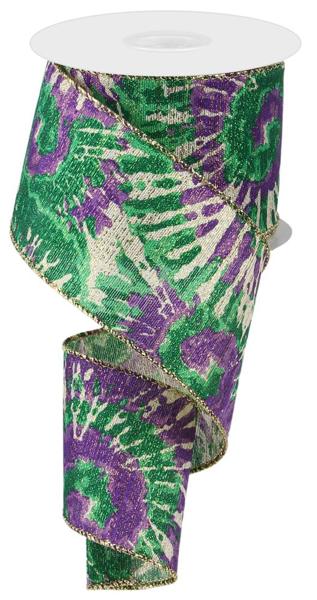 a roll of purple and green patterned ribbon