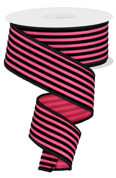 A spool of pink and black striped ribbon.