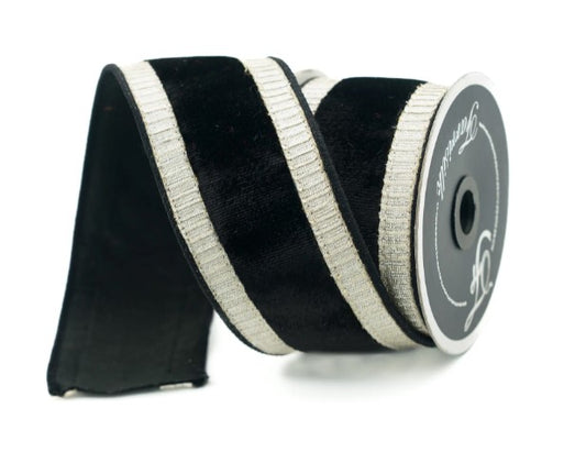 A black and white ribbon with a silver stripe is shown against a white background.