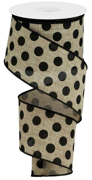 a roll of black and white polka dot ribbon
