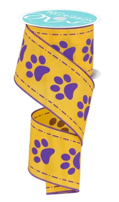 A yellow ribbon with purple paw prints printed on it.