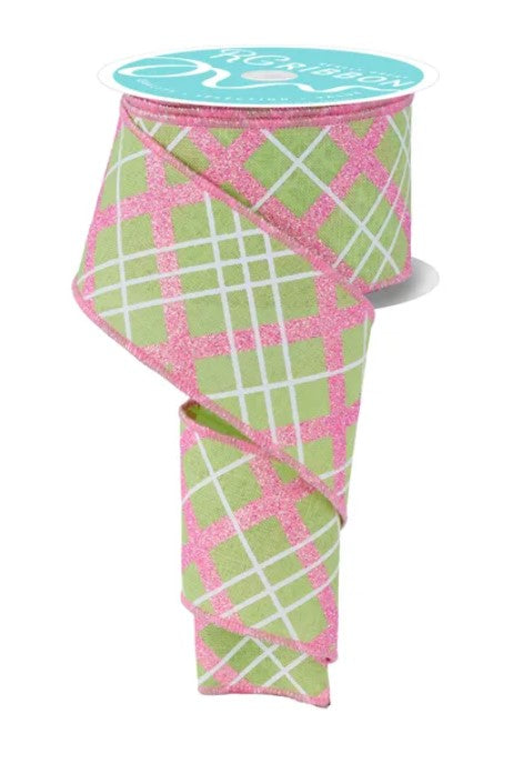 A pink and green checkered pattern ribbon is shown, with a turquoise label on top.