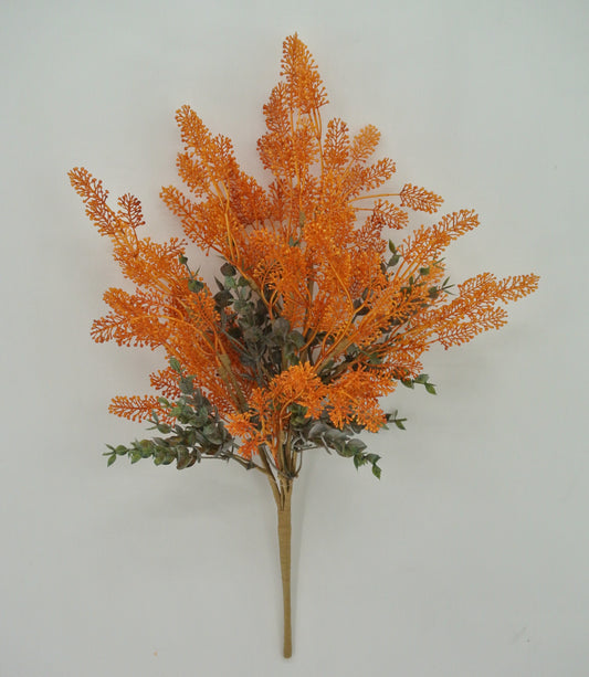 A bouquet of orange and green artificial flowers is displayed against a white background.