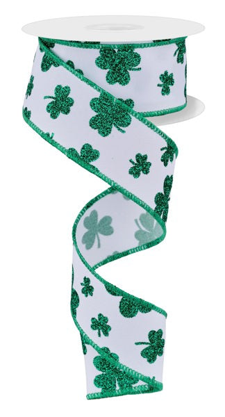 a green and white ribbon with shamrocks on it