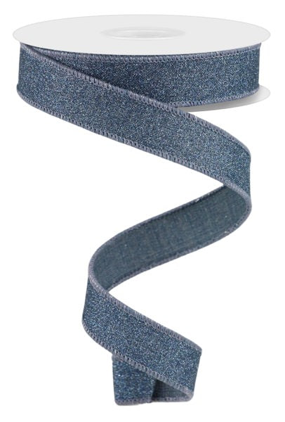 a roll of blue glitter ribbon on a white background