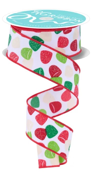 A spiral-shaped ribbon with a pattern of red, green, and white hearts on a white background.