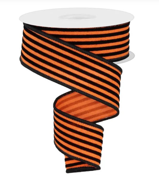 A spiral-shaped black and orange striped ribbon is shown against a white background.