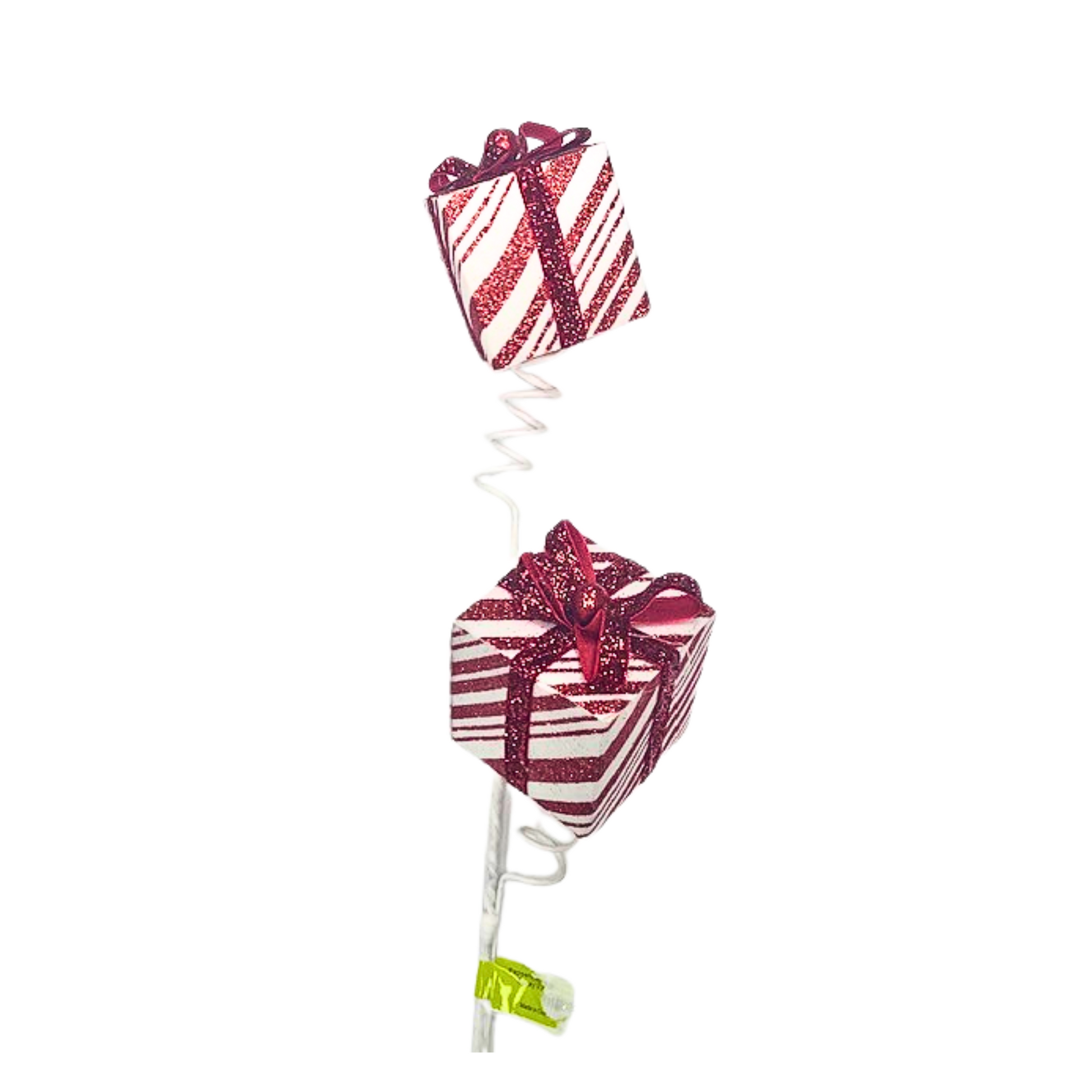 a red and white striped cake on a stick