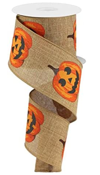 a roll of halloween ribbon with pumpkins on it