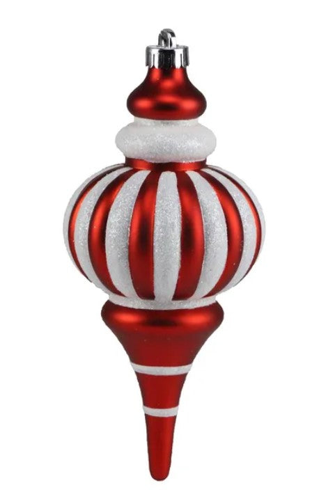 A red and white striped ornament with a pointed finial and a small silver clasp.
