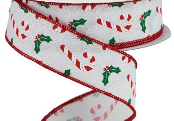 a white christmas ribbon with holly and candy canes on it