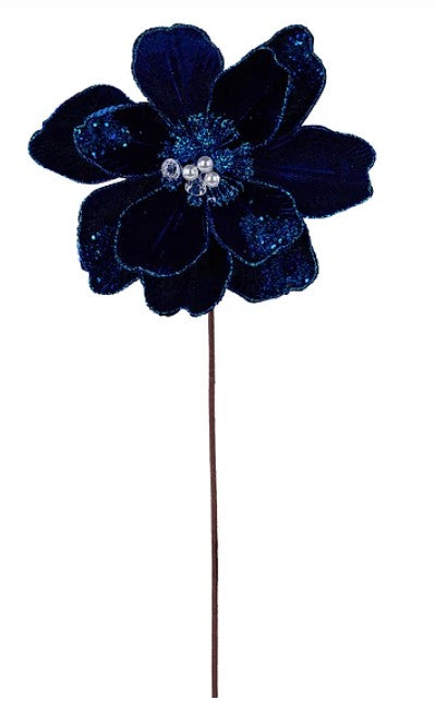 A single, large blue flower with a glittery center is the main focus of the image.