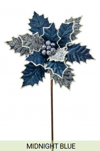 A blue and white poinsettia flower with a small cluster of blue berries at the center.