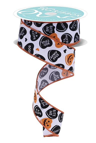A Halloween-themed ribbon with a repeating pattern of pumpkins and the words "BITE ME" printed on it.