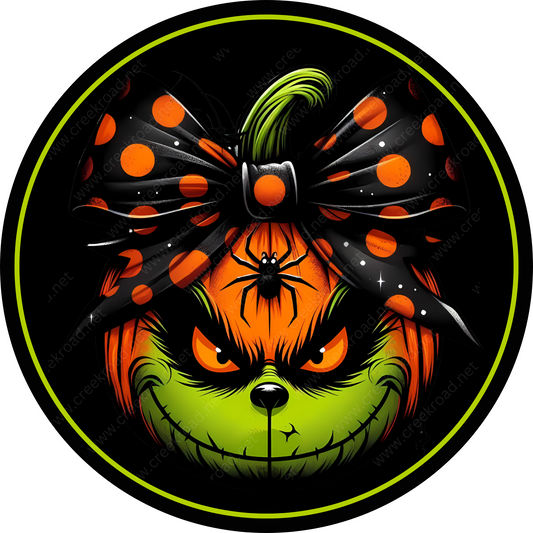 a pumpkin with a bow on it's head