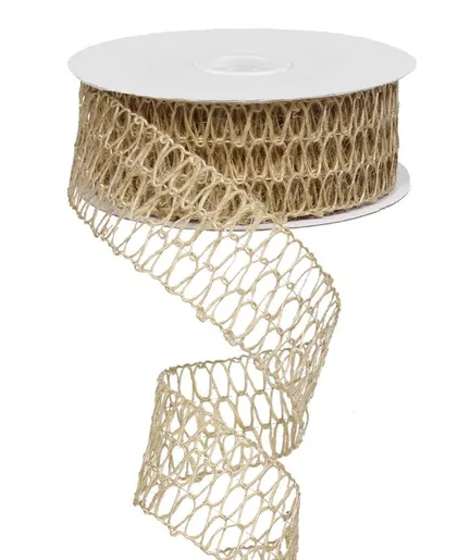 A roll of beige, woven ribbon with a spiral pattern, sitting on a white surface.
