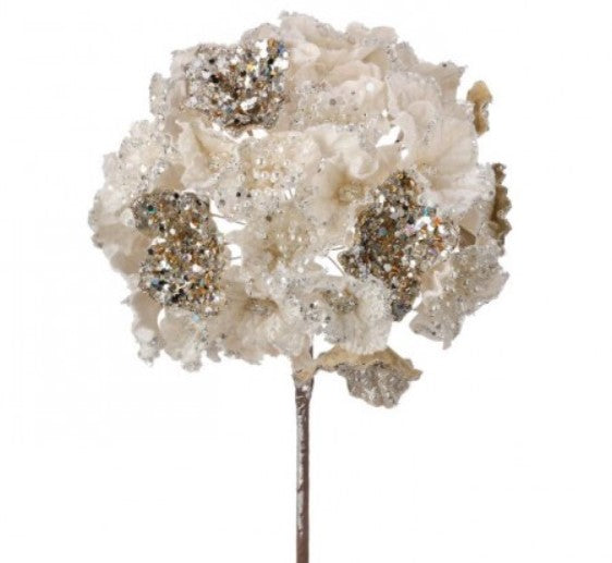A bouquet of white flowers with gold accents, creating a visually appealing and elegant arrangement.