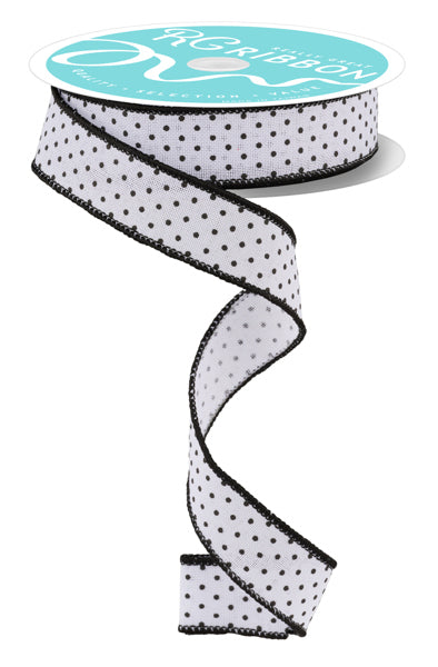 a white and black polka dot ribbon on a white background