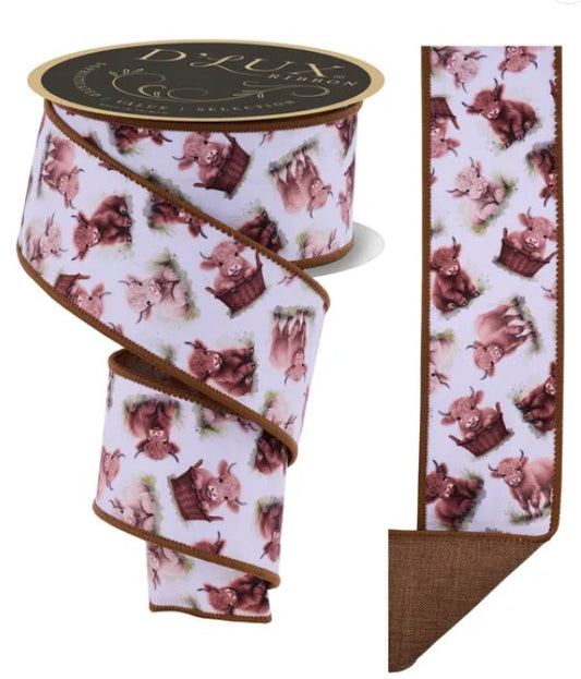 a ribbon with a repeating pattern of brown cows on a white background.