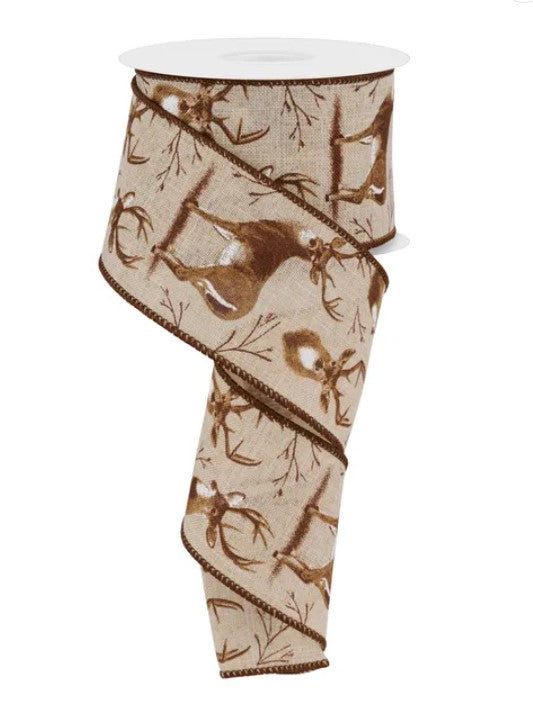 a beige ribbon with a repeating pattern of brown deer silhouettes.