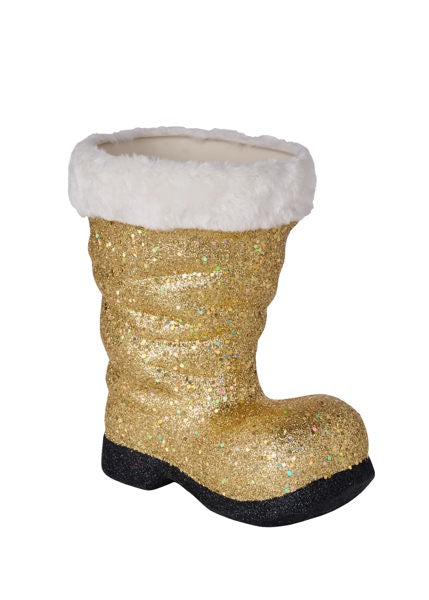 A gold glittery boot with a white fur trim.