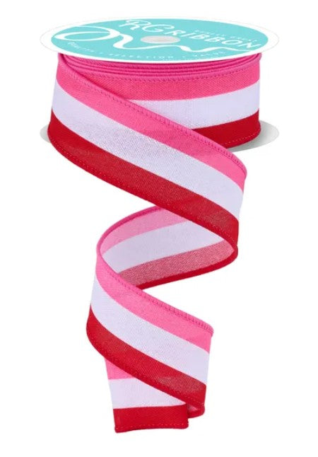 A pink and white striped ribbon is shown, with the ribbon winding around a spool of the same ribbon.