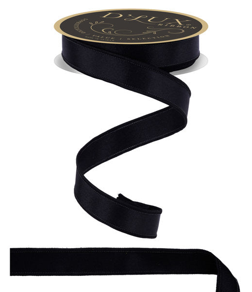 A black ribbon with a gold label, which appears to be a decorative or decorative ribbon.