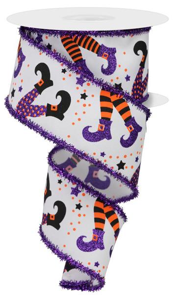 a roll of purple and orange halloween ribbon