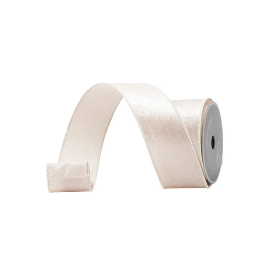 A roll of pale pink satin ribbon is shown against a white background.