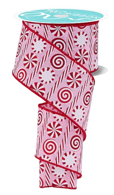 A pink and red candy cane-patterned ribbon is shown, with a turquoise backing and a white label.